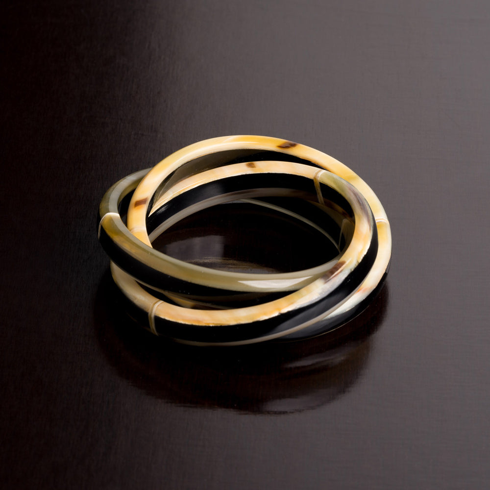 Follina Armreifen Horn verschlungen